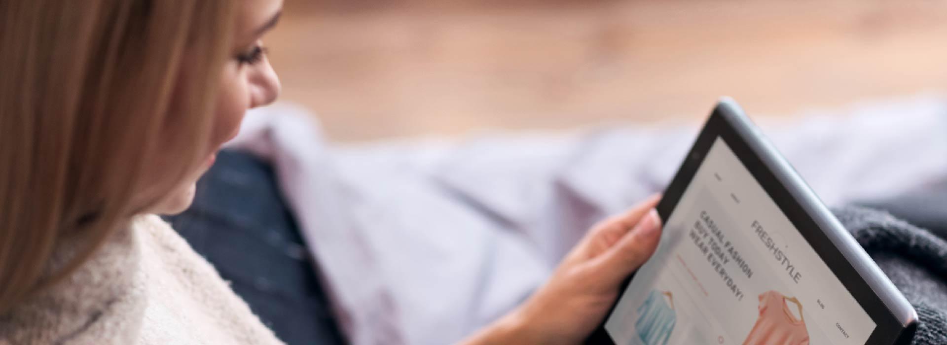 Woman updating online store