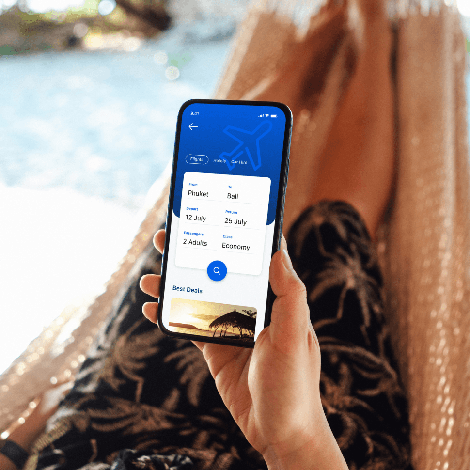 Woman at pool looking at phone