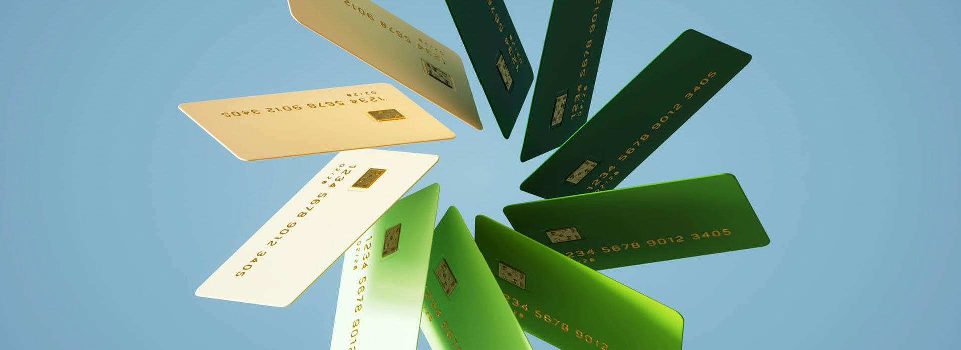 white, green and yellow credits forming a pinwheel in the air