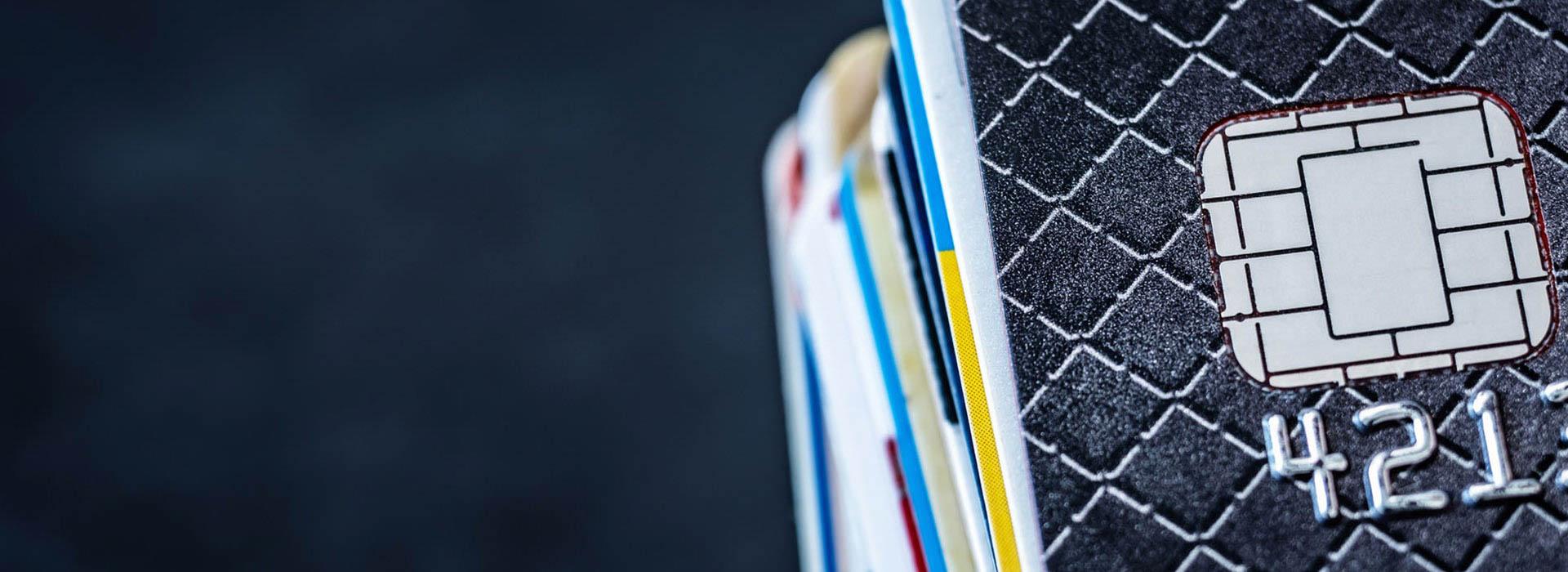 EMV chips on stack of credit cards